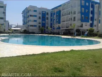 Appartement à louer à Houmat Jadida, avec 1 chambre un salon et une piscine.
