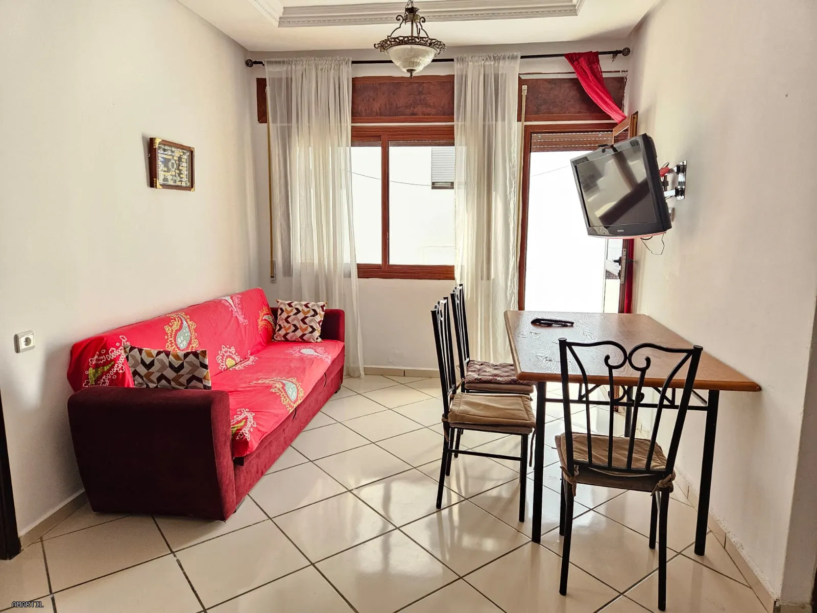 appartement à louer à martil salon et 1 ch ,balcon